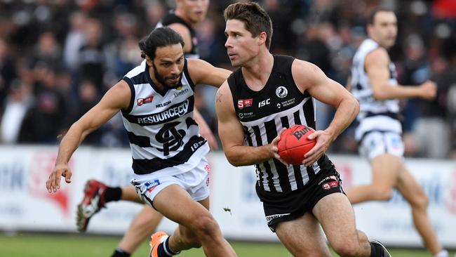 Port Adelaide's Steven Summerton takes on South’s Matthew Rankine in 2016. Photo: Tom Huntley