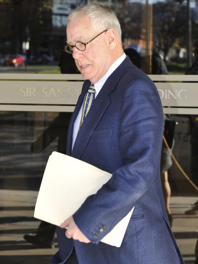 Forensic psychologist Dr Allen Fugler leaving court in 2012. Picture: Campbell Brodie