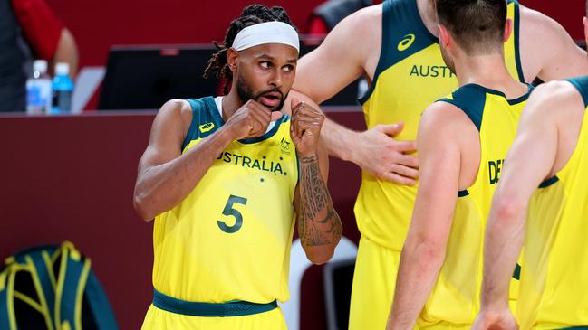 Patty Mills with fellow Boomers in Tokyo, Japan. Picture: Getty Images