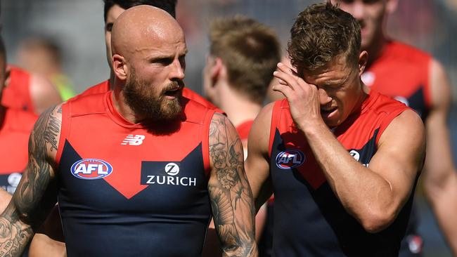 A shell-shocked Nathan Jones and Jake Melksham at halftime during this year’s preliminary final. Picture: AAP