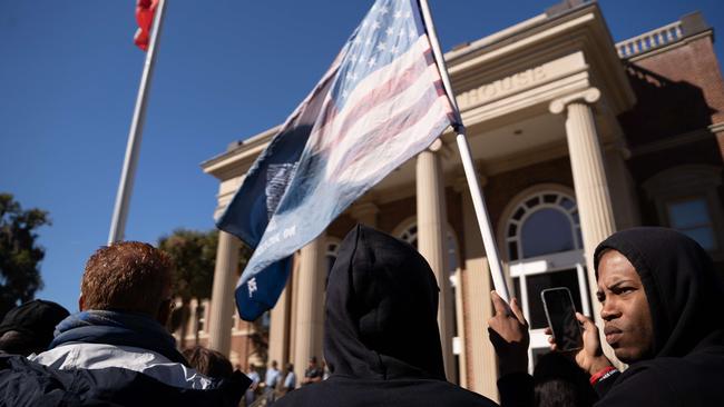 People wait for an announcement of a verdict in the trial of the killers of Ahmaud Arbery outside the Glynn County Courthouse in Brunswick, Georgia. Greg McMichael, his son Travis McMichael, and a neighbor, William "Roddie" Bryan were found guilty in the February, 2020 fatal shooting of 25-year-old Ahmaud Arbery. Picture: Getty Images