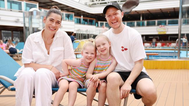 Catherine and Josh Hawkins with their kids Billie, 5, and Bobby, 3, onboard the Carnival Luminosa. Picture: Rohan Kelly