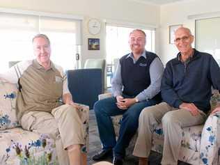 HAPPY HERE: Regency Park residents Graeme Parkinson, left, and Dudley Fitzgerald, right, enjoy the afternoon with manager Chris Newley, centre. Picture: Marian Faa