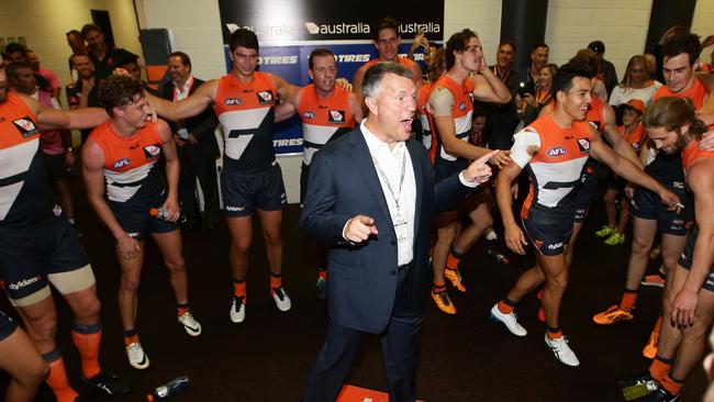 Former GWS Giants football manager Graeme Allan with the team after a win.