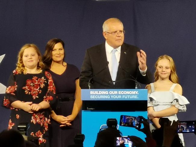 Scott Morrison is supported by his wife and daughter as he gives his victory speech at Sofitel Wentworth in Sydney. Picture: Sam Ruttyn