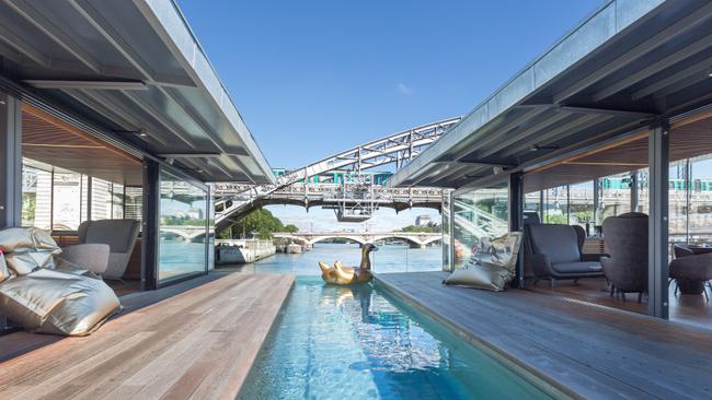 If a trip to Paris is on your bucket list, don't miss the opportunity to stay this incredible floating hotel on the Seine. OFF is a hotel and bar that offers modern amenities and mesmerizing view of the city’s famed river. The combination equals pure paradise. OFF is moored at the foot of Austerlitz station in an up-and-coming location for modern design. The blissful floating inn is located within walking distance of the Notre Dame cathedral and Hôtel de Ville. The hotel has 54 rooms and 4 suites, costing between €160-450 per night. The lodgings are decked out with bright colors that mimic the sun’s reflection off the Parisian waters. Guests can enjoy sunbathing at the plunge pool or dining at the bar with a panoramic view of the river. OFF is perfect for recuperating after a day of city exploration or a day of lounging riverside in modern luxury. Featuring: OFF Paris Seine Where: Paris, France When: 26 Jul 2016 Credit: Supplied by WENN.com **WENN does not claim any ownership including but not limited to Copyright, License in attached material. Fees charged by WENN are for WENN's services only, do not, nor are they intended to, convey to the user any ownership of Copyright, License in material. By publishing this material you expressly agree to indemnify, to hold WENN, its directors, shareholders, employees harmless from any loss, claims, damages, demands, expenses (including legal fees), any causes of action, allegation against WENN arising out of, connected in any way with publication of the material.**