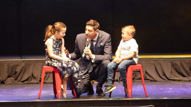 Basil Zempilas speaks with last years Telethon kids during today’s giving ceremony.