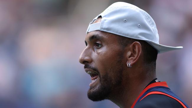 Nick Kyrgios of Australia reacts against Benjamin Bonzi