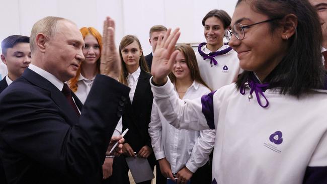 Hey kids. (Photo by Gavriil GRIGOROV / SPUTNIK / AFP)