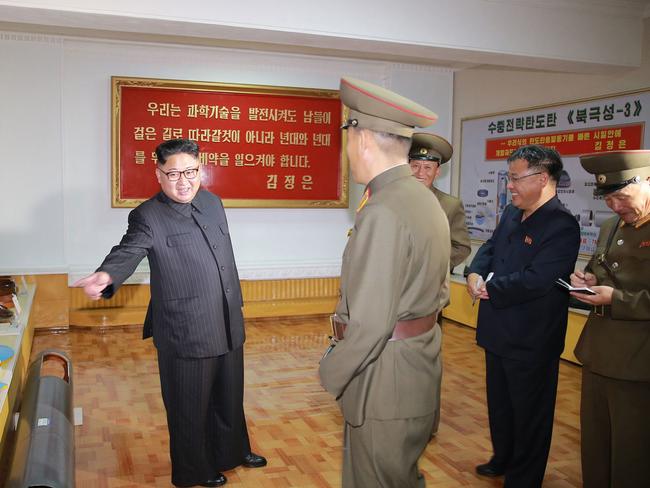 Kim visited the Chemical Material Institute of Academy of Defense Science last week ahead of its provocative missile launch. Picture: KRT/AP