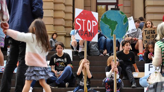 Outside Melbourne’s Old Treasury building in Spring Street. Picture: Jason Edwards