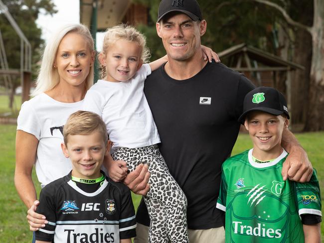 Morris with who plays U11's for Gymea Gorillas (green shirt) Taj (black shirt) and daughter Halle (4). Picture: Julian Andrews