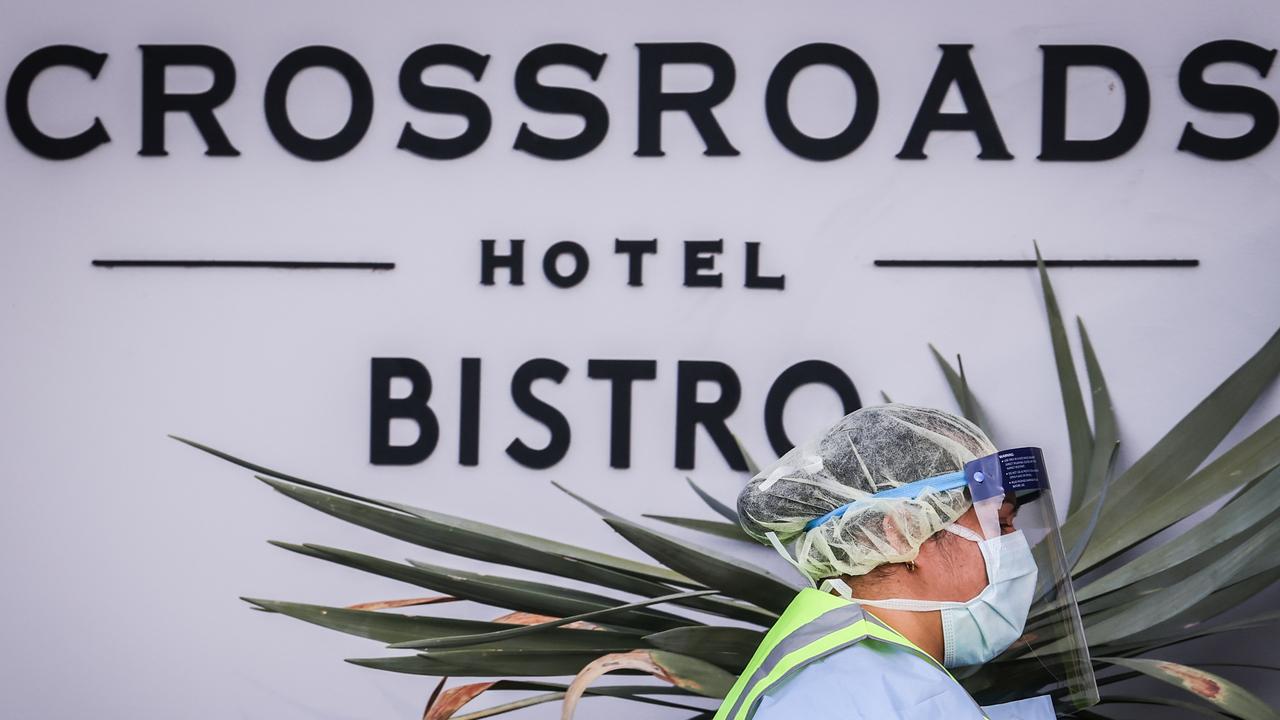 Medical staff perform COVID-19 tests on drivers outside the Crossroads Hotel in Sydney’s Casula. Picture: David Gray/Getty Images