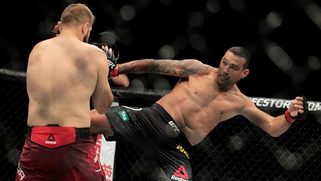 Fabricio Werdum kicks Marcin Tybura during the main heavyweight fight at UFC Fight Night Sydney. (AAP Image/Ben Rushton)
