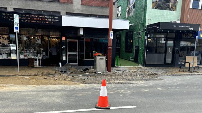 Burst water main on Liverpool Street, Hobart causes damage. Picture: Simon McGuire