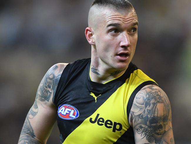 Dustin Martin of the Tigers is seen in action during the Round 20 AFL match between the Melbourne Demons and the Richmond Tigers at the MCG in Melbourne, Saturday, August 3, 2019.  (AAP Image/Julian Smith) NO ARCHIVING, EDITORIAL USE ONLY