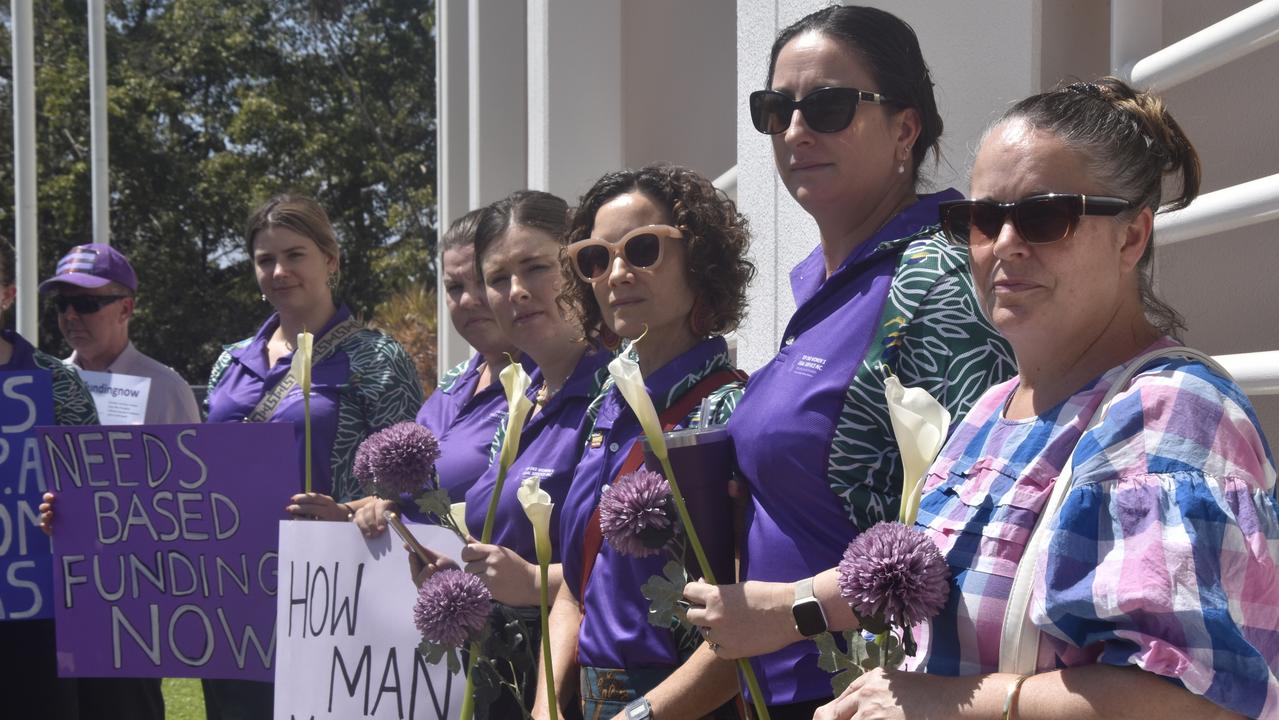 Top End Women's Legal Service representatives joined a Territory-wide day of action on Tuesday outside the NT parliament in Darwin calling for action to address chronic domestic violence rates.