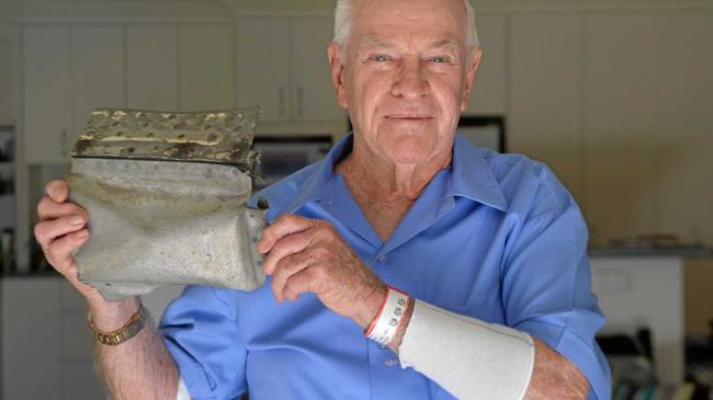 Ian Hamilton with a piece of his brother's beaufighter that a woman gave him when he visited Flekkefjord, Norway. Picture: Caitlan Charles