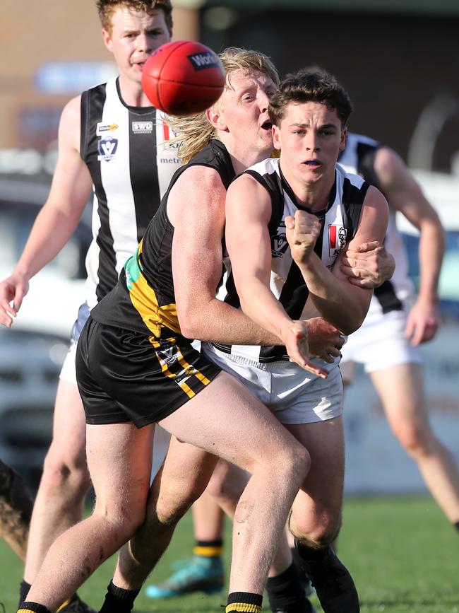 Morwell’s Burkeley Macfarlane, centre, starred in the win against Maffra. Picture Yuri Kouzmin
