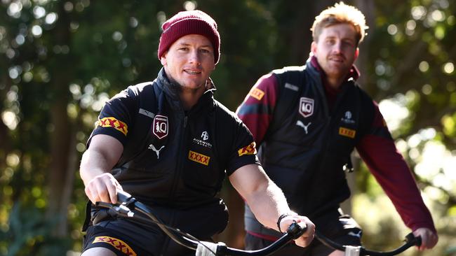 Leader of the pack: Harry Grant and Cameron Munster arrive at Maroons training in style. Picture: Chris Hyde/Getty Images