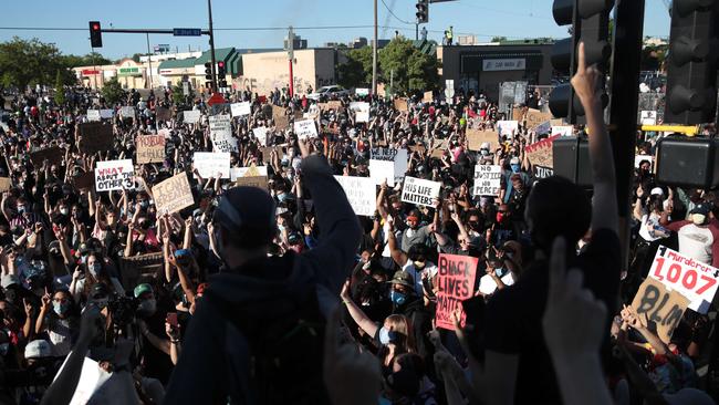 Demonstrators gather to protest the killing of George Floyd on May 30.