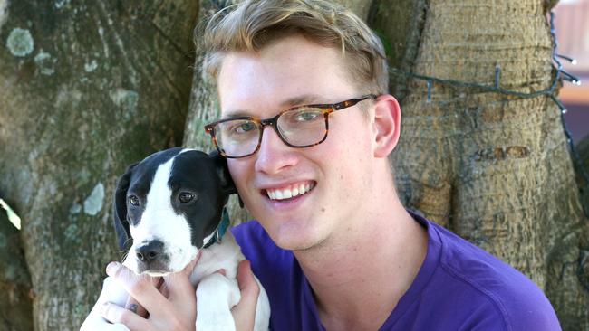 James Healy with Spot the dog — the AWLQ has been inundated with unwanted pets. Picture Mike Batterham.