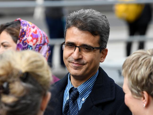 Dr Seyyed Farshchi departs the County court of Victoria, Melbourne, Monday, September 23, 2019. Dr. Seyyed Farshchi and his wife Naghmeh Mostafei have been committed for trial over slavery-related charges after allegedly forcing an Iranian asylum seeker to work at their Box Hill bakery in Melbourne's east. (AAP Image/James Ross) NO ARCHIVING