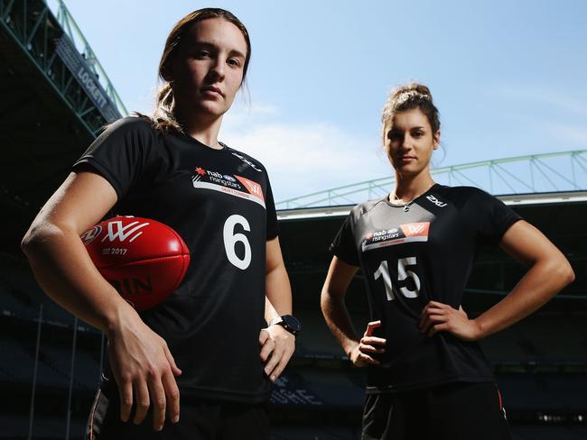 MELBOURNE, AUSTRALIA - OCTOBER 03:  Arianna Clarke from Queensland (L) and Jasmine Hewett from the Northern Territory pose during the AFLW Draft Combine media conference at Etihad Stadium on October 3, 2017 in Melbourne, Australia.  (Photo by Michael Dodge/Getty Images)