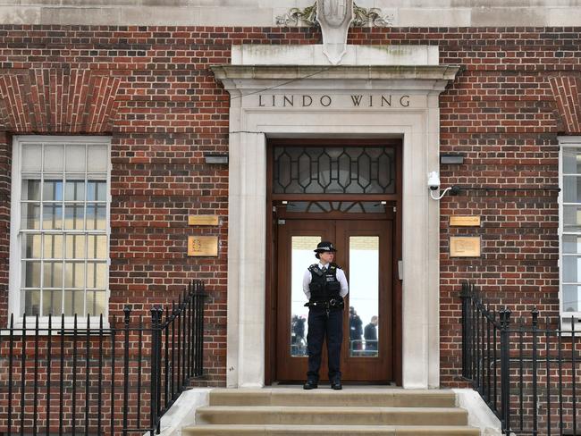 A police officer stands outside the Lindo Wing of St Mary’s Hospital in Paddington, after the Duchess was admitted on Monday. Picture: Dominic Lipinski/PA via AP.