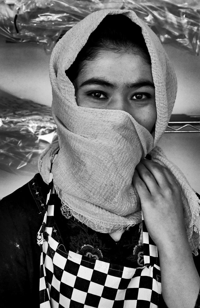 Parwana Parwana, 20, of Guildford, at the New Sydney Bakery in Fairfield, where she works. Picture: Jeremy Piper