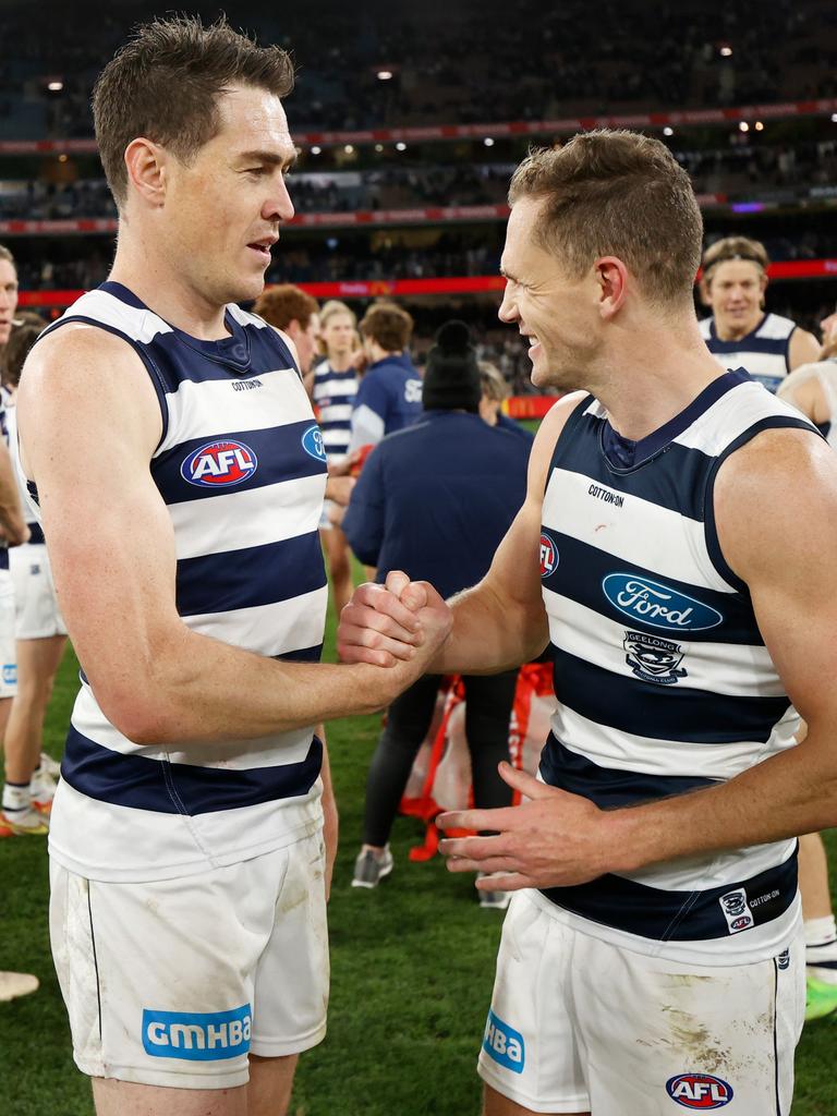 Jeremy Cameron and Joel Selwood celebrate on the MCG. Picture: Michael Willson/AFL Photos via Getty Images)