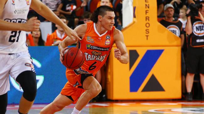 Jarrod Kenny takes off down the court in the National Basketball League (NBL) match between the Cairns Taipans and the Adelaide 36ers, held at the Cairns Convention Centre. PICTURE: BRENDAN RADKE.