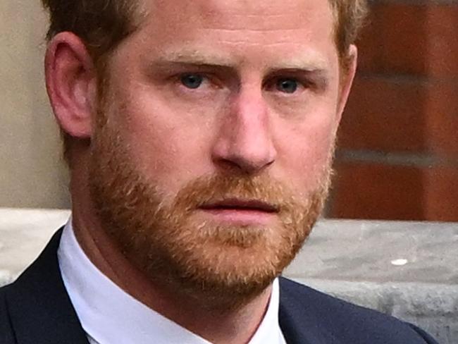 (FILES) Britain's Prince Harry, Duke of Sussex leaves from the Royal Courts of Justice, Britain's High Court, in central London on March 27, 2023. Lawyers for Prince Harry on December 5 began a legal challenge over his security arrangements in the UK, after he quit frontline royal duties and moved to North America.  The case about his loss of UK taxpayer-funded protection is the latest in a string of court proceedings initiated by Harry, whose father is King Charles III. (Photo by JUSTIN TALLIS / AFP)