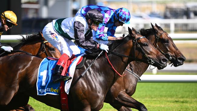 MELBOURNE, AUSTRALIA - FEBRUARY 10: Craig Williams riding Mr Brightside (L) defeats Declan Bates riding Pride of Jenni in Race 9, the Sportsbet C.f. Orr Stakes during Melbourne Racing at Caulfield Racecourse on February 10, 2024 in Melbourne, Australia. (Photo by Vince Caligiuri/Getty Images)