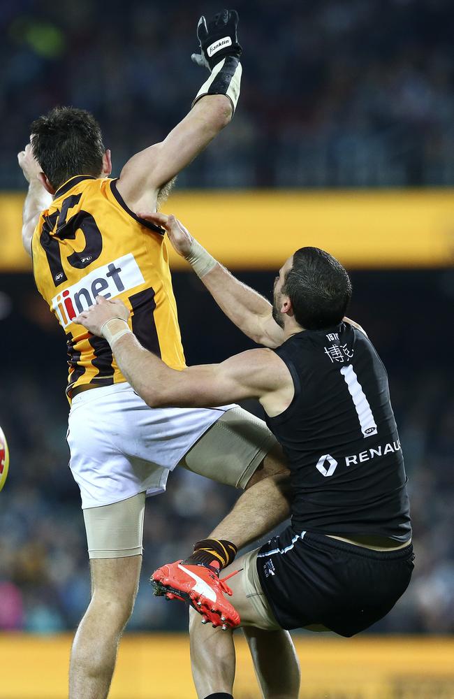 Luke Hodge collects Travis Boak with a knee. Picture: Sarah Reed.