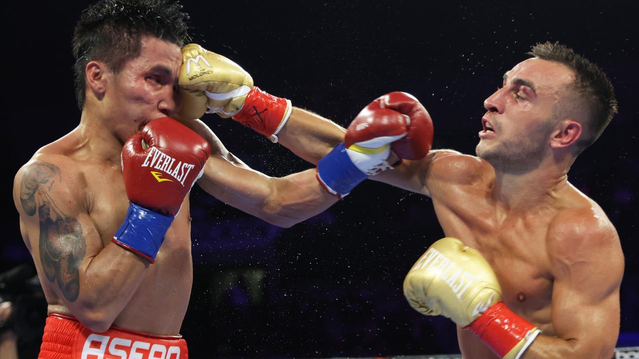 Vincent Astrolabio (left) and Jason Moloney exchange punches during their WBO bantamweight championship fight. (Photo by Mikey Williams/Top Rank Inc via Getty Images)