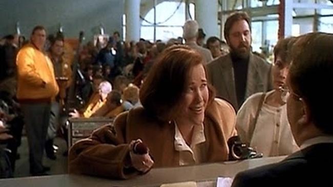 See the bearded man over Catherine O’Hara’s left shoulder? Is it Elvis?