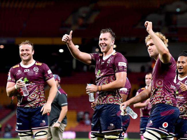 Harry Wilson (left) and his Reds’ teammates Angus Blyth (centre) and Angus Scott-Young are ready for the Rebels on Saturday night. Picture: Bradley Kanaris/Getty Images