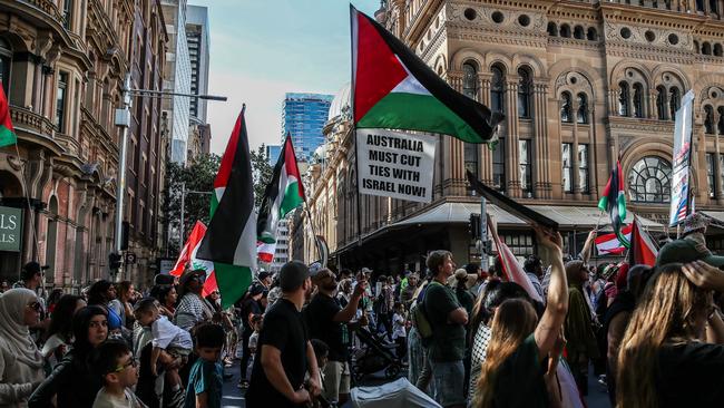 Protesters marching through the Sydney CBD on Sunday. Picture: Roni Bintang/Getty Images