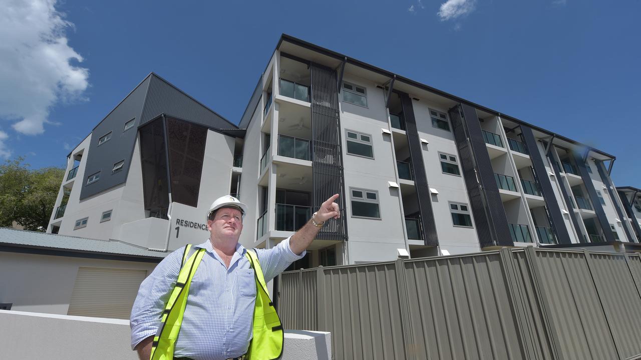 DCOH chief executive outside the Akoya flats in Fannie Bay.