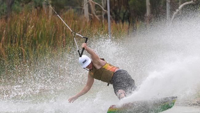 A man tries out a new cable ski park in Townsville, similar to the one planned for Murray Bridge.