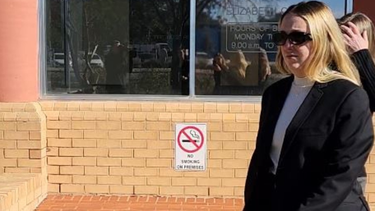 Hannah Neale leaves Elizabeth Magistrates Court after appearing on child sex charges.