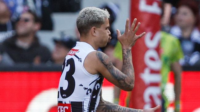 MELBOURNE, AUSTRALIA - MAY 18: Bobby Hill of the Magpies celebrates a goal during the 2024 AFL Round 10 match between The Collingwood Magpies and Kuwarna (Adelaide Crows) at The Melbourne Cricket Ground on May 18, 2024 in Melbourne, Australia. (Photo by Dylan Burns/AFL Photos via Getty Images)