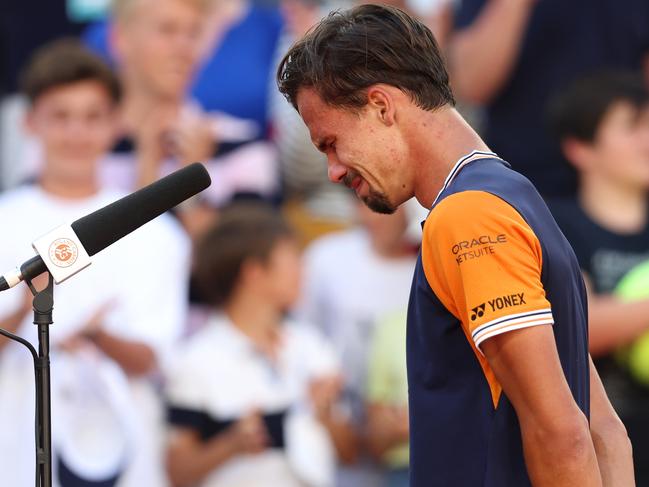 PARIS, FRANCE - JUNE 01: Daniel Altmaier of Germany celebrates emotionally after winning match point against Jannik Sinner of Italy during the Men's Singles Second Round match on Day Five of the 2023 French Open at Roland Garros on June 01, 2023 in Paris, France. (Photo by Julian Finney/Getty Images)