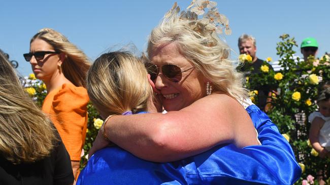 Belinda Holland hugs Jamie Kah after she won the Newmarket Handicap on Cylinder.