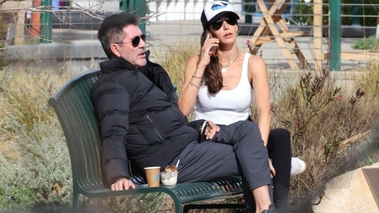 Newly engaged couple Simon Cowell and Lauren Silverman step out for coffee and ice cream in Malibu. Picture: BackGrid Australia