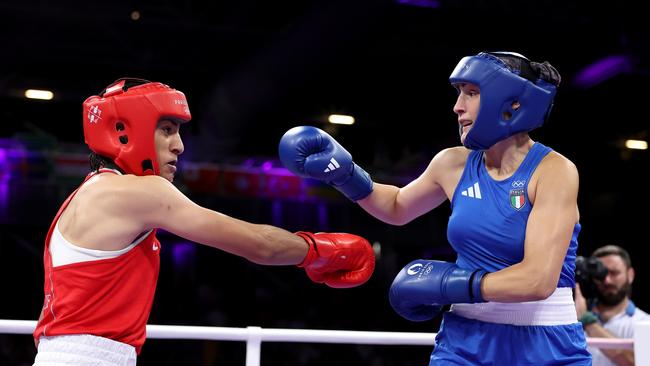 Imane Khelif of Algeria and Angela Carini of Italy exchange punches during the women's 66kg preliminary round match on day six of the Olympic Games in Paris 2024. Picture: Getty Images