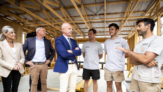 Minister Elise Archer, Jeremy Rockliff and Premier Peter Gutwein talk to Luke Eiszele and some of his apprentices. New Tasmanian Premier Peter Gutwein out on a Sandy Bay building site. Picture: RICHARD JUPE