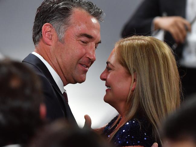 Dr James Muecke is hugged by his wife Mena after he was named Australian of the Year for 2020. Picture: AAP Image/Mick Tsikas