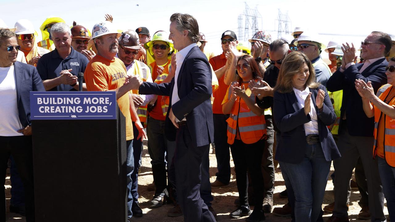 Ms Alvarado-Gil celebrating with Governor Gavin Newsom at the construction site of Battery Energy Storage Systems. Picture: John G. Mabanglo-Pool/Getty Images/AFP